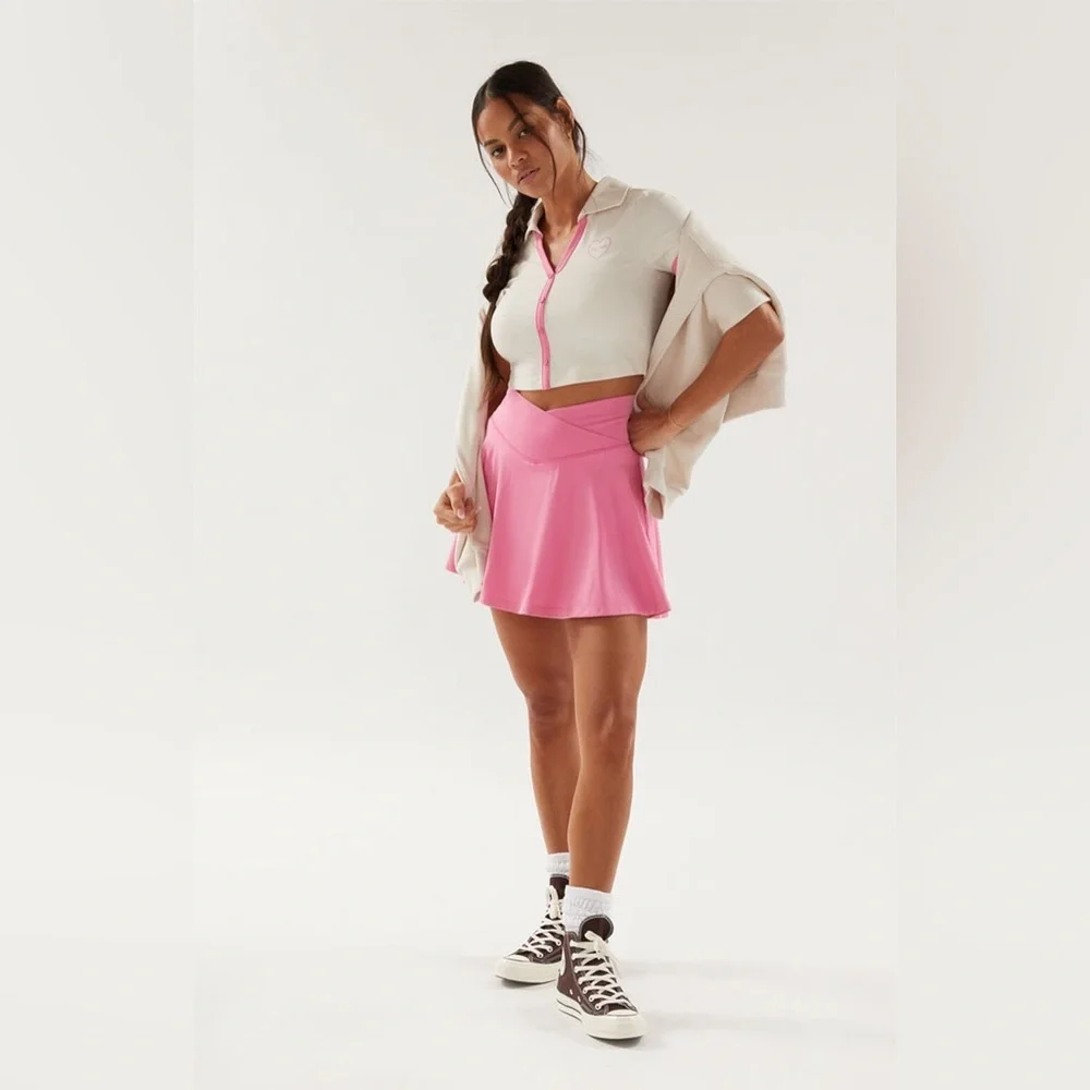 PacSun | PAC 1980 WHISPER Active Crossover Front Mini Skirt in Pink Medium